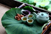 enjoy lotus tea on hanois west lake